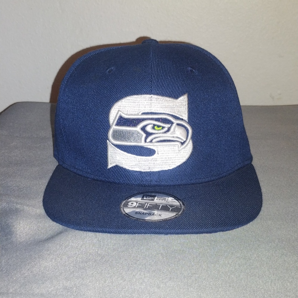 Seattle Seahawks New Era snapback hat, under bill w/American flag